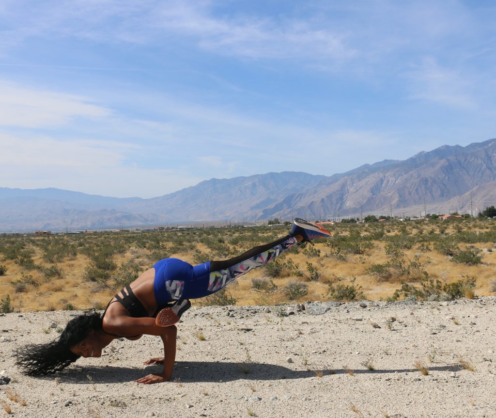 lizard-pose-arm-balance-black-girl-yoga-palm-springs-california-mountains-self-care-positive-mantra-beauty-and-the-beat-blog